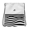 A white drawstring backpack featuring a black and white horizontal striped wavy pattern on the lower half and a small gray cowboy hat logo on the upper right.